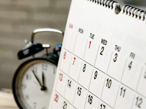 A close up image of a calendar showing the days of the month.