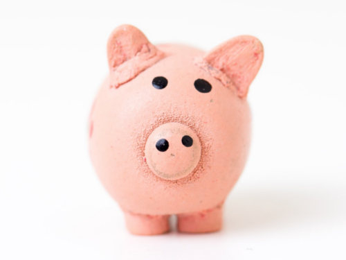 A closeup of a pink piggybank.